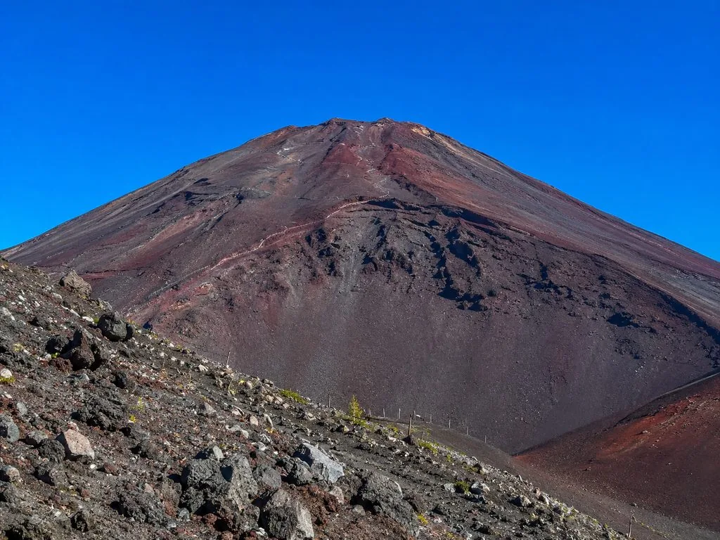 The bare summit cone of Mount Fuji seen from the Fuji Subaru Line 5th Station